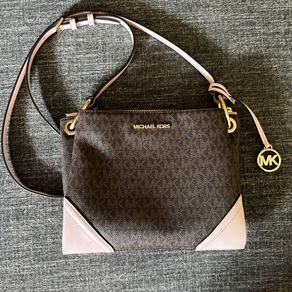 Michael Kors brown and pink purse.